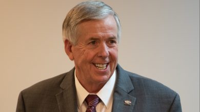 Photo of Missouri Governor Mike Parson encourages people to get the Covid-19 vaccine at Kanas City vaccination event