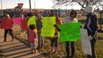 Photo of Protests Outside of Mercy Hospital in St Louis Over Flu Shots