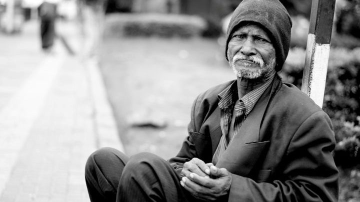 man in sock cap on street