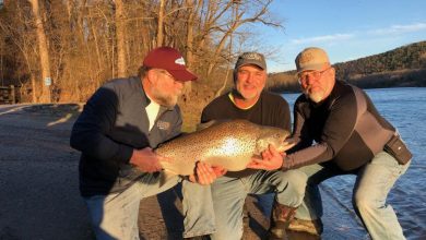 Photo of Neosho man catches state-record brown trout