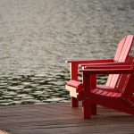 red chair near lake