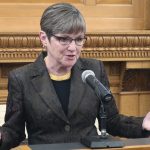 Kansas, Governor Laura Kelly, Medicaid, protst, banners, blood on their hands, Kansas Statehouse