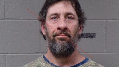 Photo of Man arrested with several firearms near Pineville Elementary