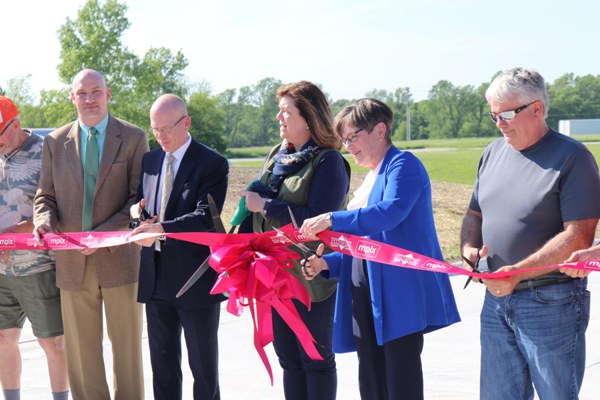 Kelly ribbon cutting