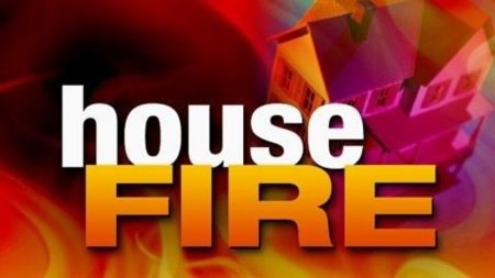 Early morning house fire in Joplin with a person trapped inside