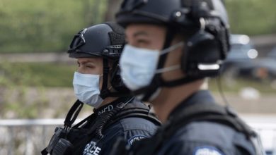 Photo of Police in St. Louis showing increased Covid-19 positive