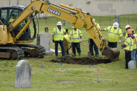 19 bodies reburied amid protests in search for Tulsa victims