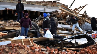 Photo of Missouri officials assessing damage from Friday’s tornadoes