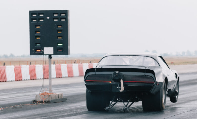 Dragster Sets Off On The Racetrack. Dragster On The Speedway. Dr