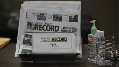 Photo of Kansas police and a small newspaper are at the center of a 1st Amendment fight after a newsroom raid