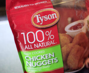 Earns Tyson Foods