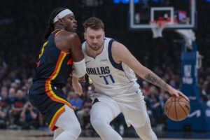 Doncic posts 31-point triple-double as Ma...