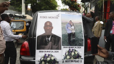 Photo of Hundreds mourn gang killings of Haitian mission director and young couple