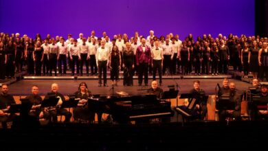 Photo of University group and Pittsburg High School group partner to perform for public